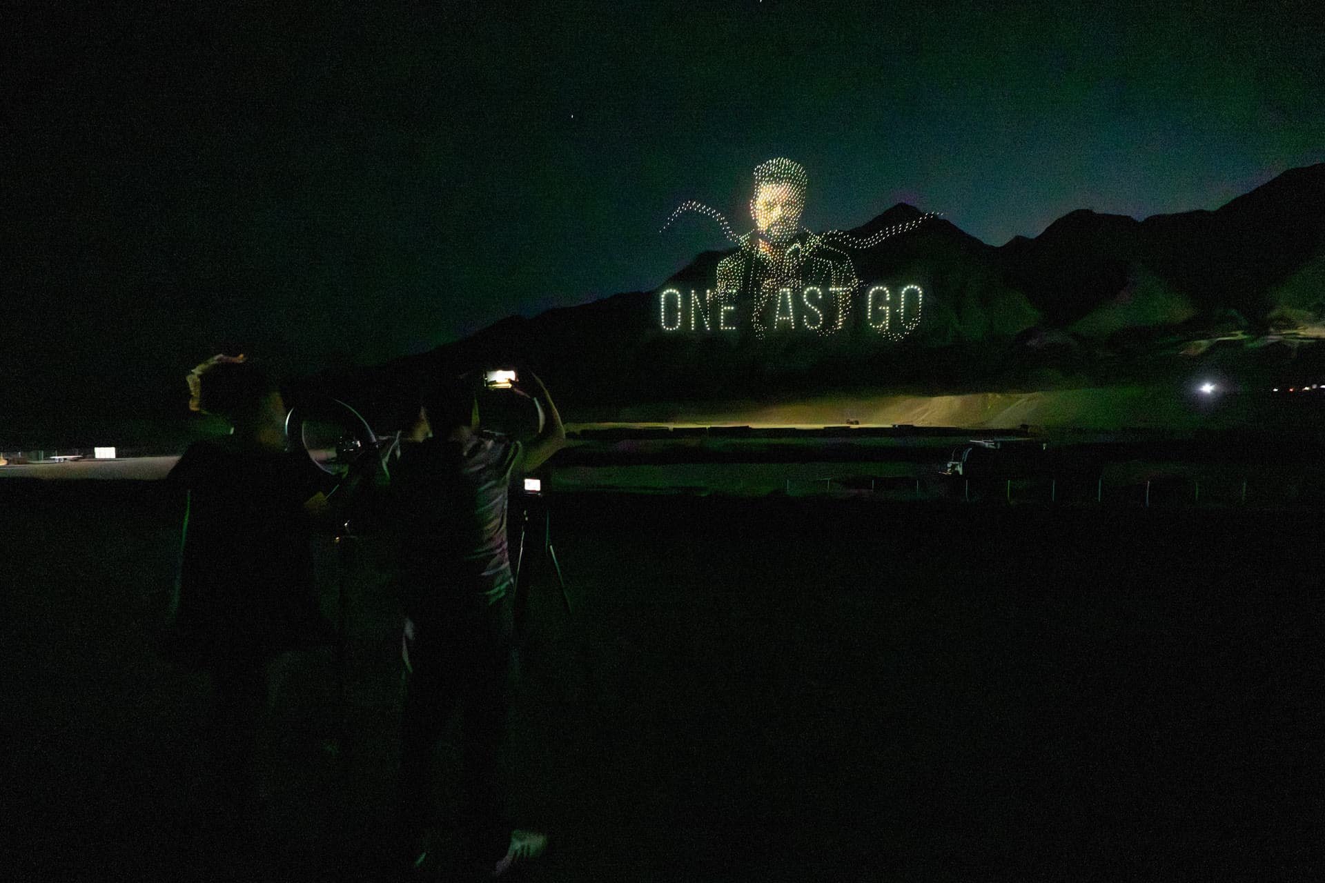 Guests filming a Billy Butcher drone portrait and One Last Go lettering during The Boys production